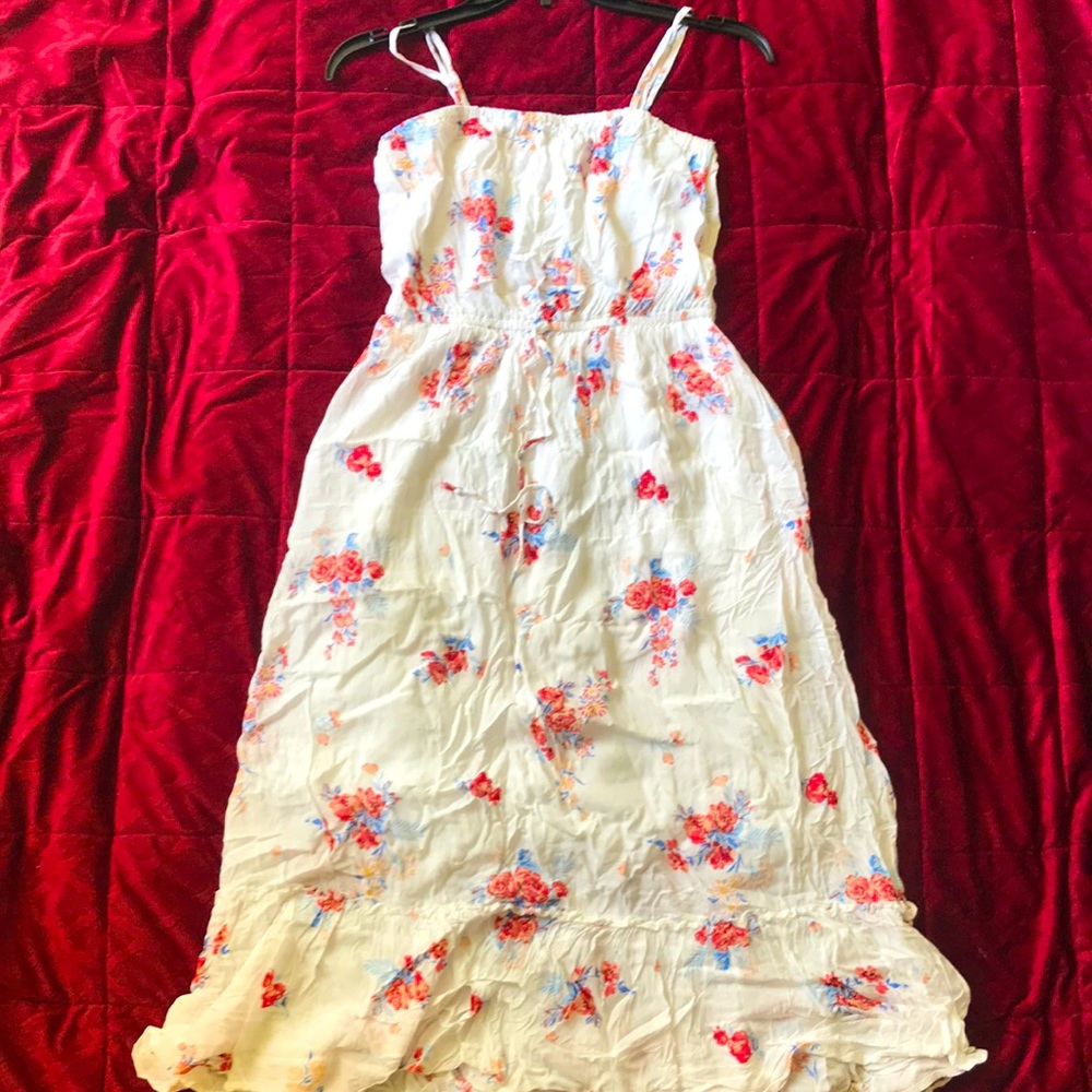 This is a Blue Rain Dress. It has only been worn once, and in great condition.
